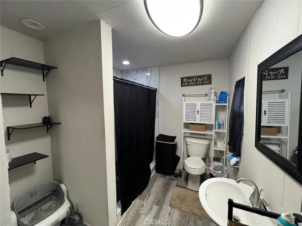 a kitchen with stainless steel appliances a refrigerator and a stove