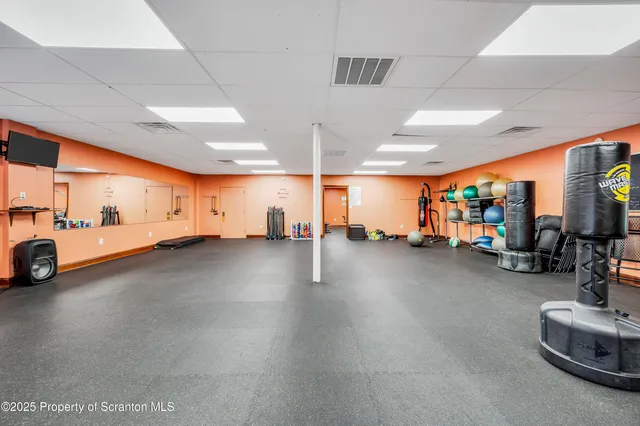 a view of a room with gym equipment