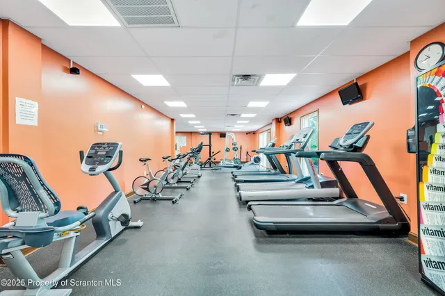 a view of a room with gym equipment
