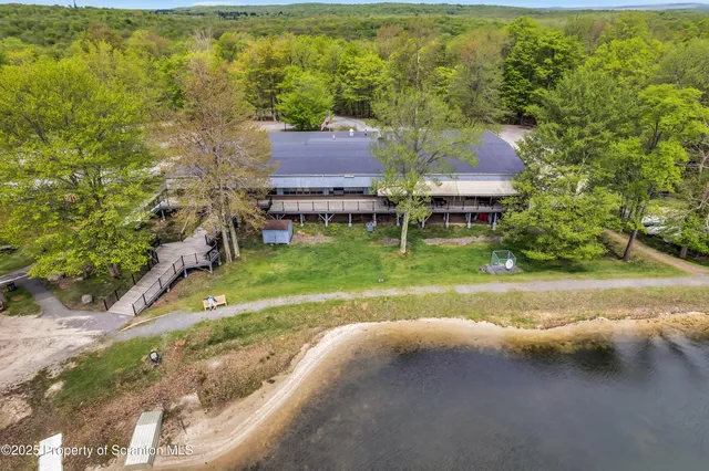 a view of a street with a building in the background
