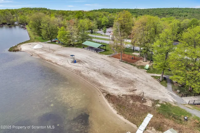 a view of a lake and sunset