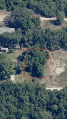 a view of a yard with green space