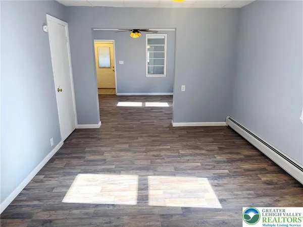 a view of an empty room and window