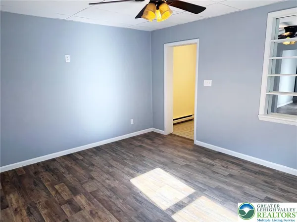 a view of an empty room and window