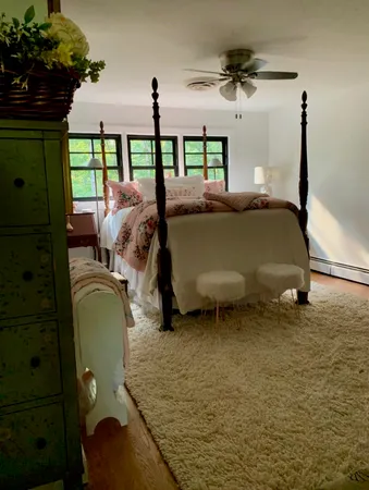 a bathroom with mirror sink and vanity
