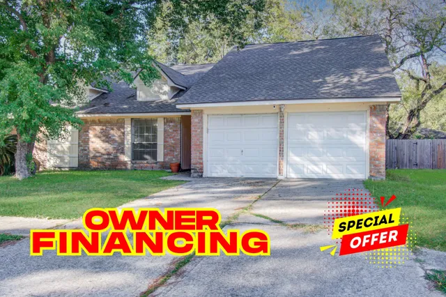 a view of outdoor space with yard and garage
