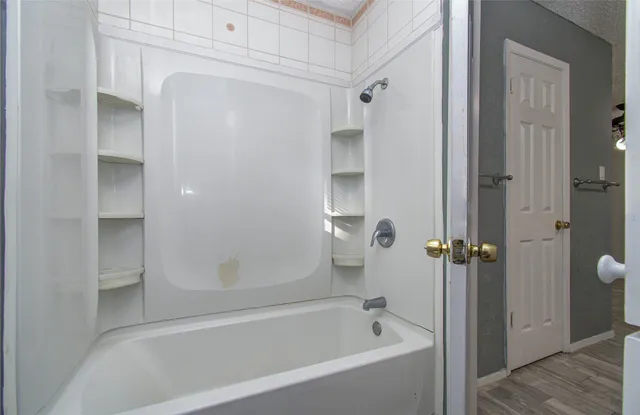 a bathroom with a bathtub