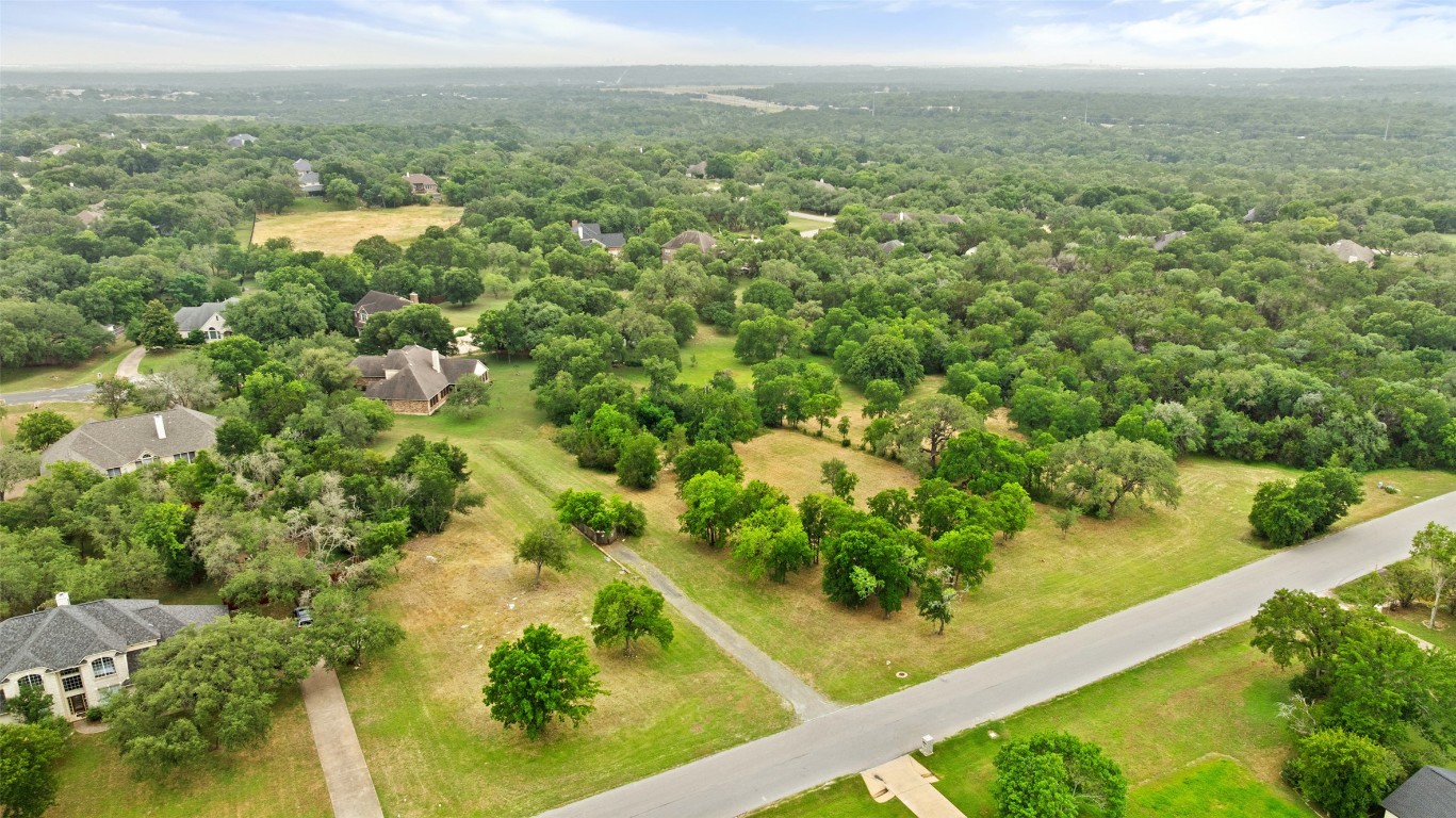 a view of a lake with a city
