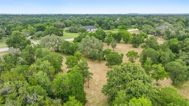 a view of a lake with a city