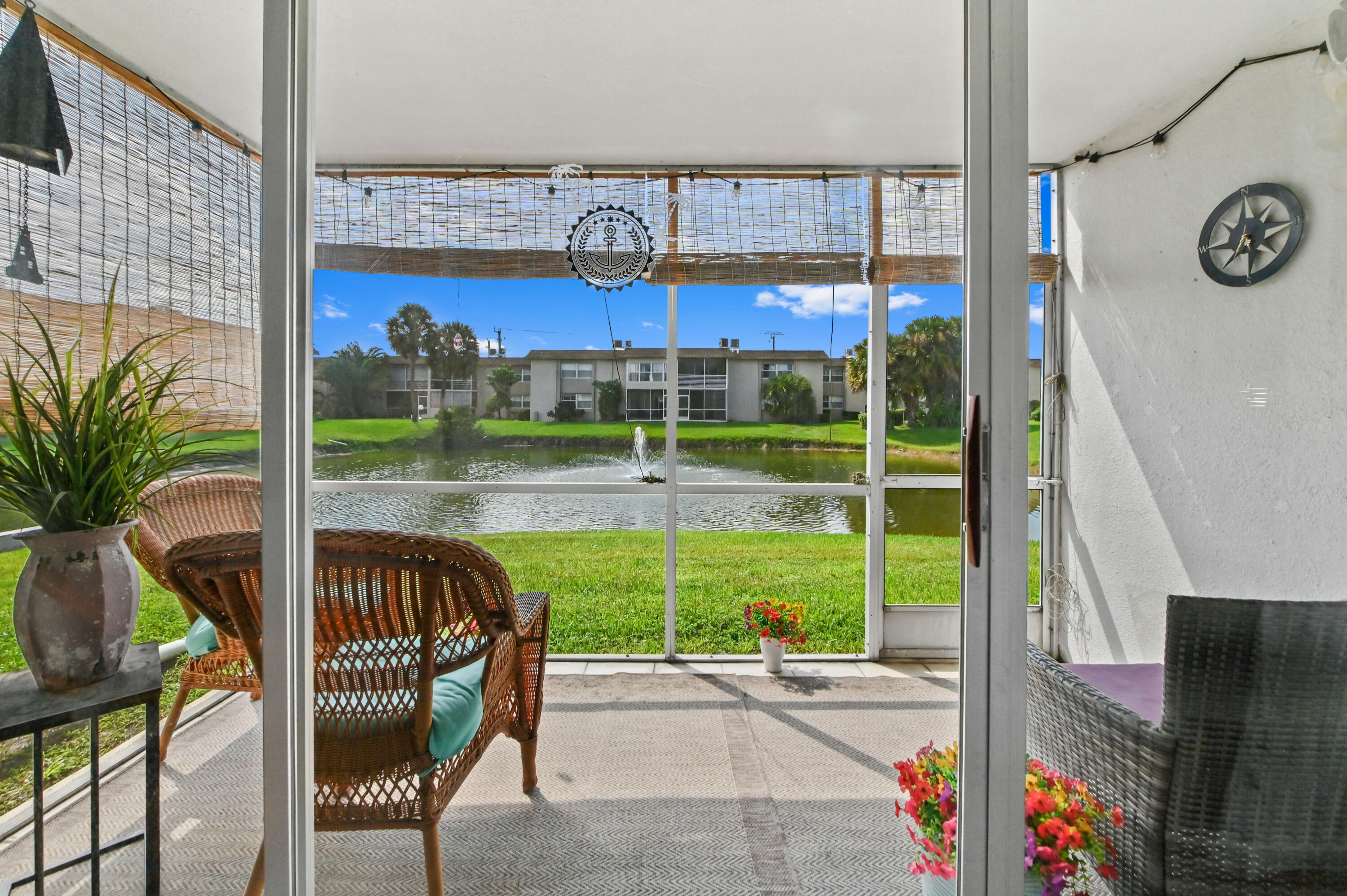 504 Davis Road, Unit 97 Palm Springs, FL 33461 - Photo 21 of 34 21 sunroom 01