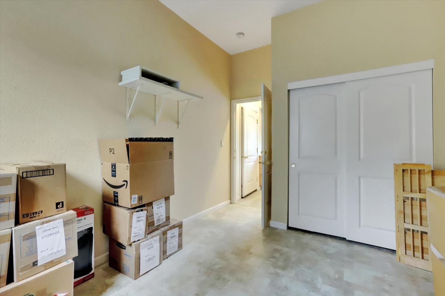 17036 Alice Way Grass Valley, CA 95949 - Photo 47 of 58 a view of a storage & utility room with empty racks
