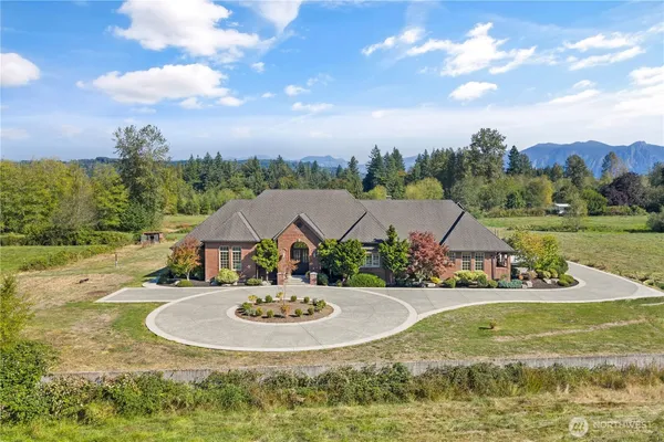 a view of a swimming pool with a yard