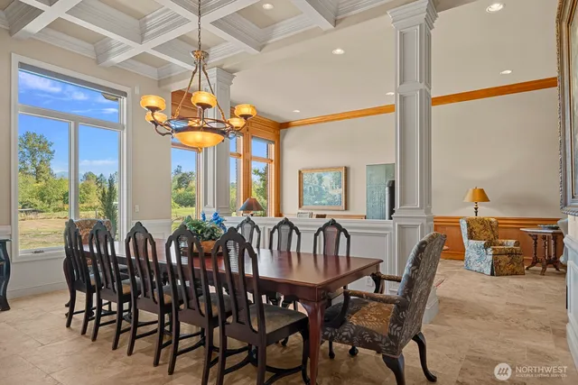 a view of a dining room with furniture window and outside view
