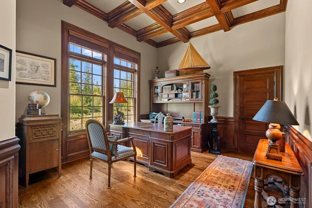 a work room with furniture and wooden floor