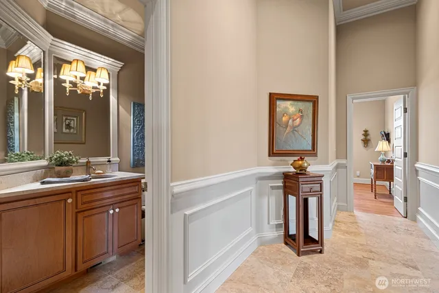 a view of a bathroom with dual sinks