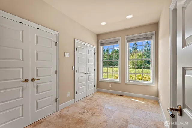 an empty room with windows