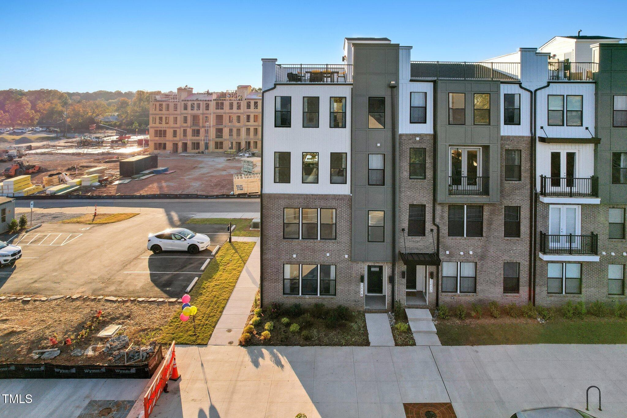 1227 Shaw View Alley, Unit 201 Raleigh, NC 27601 - Photo 1 of 29 1-web-or-mls-DJI_0281