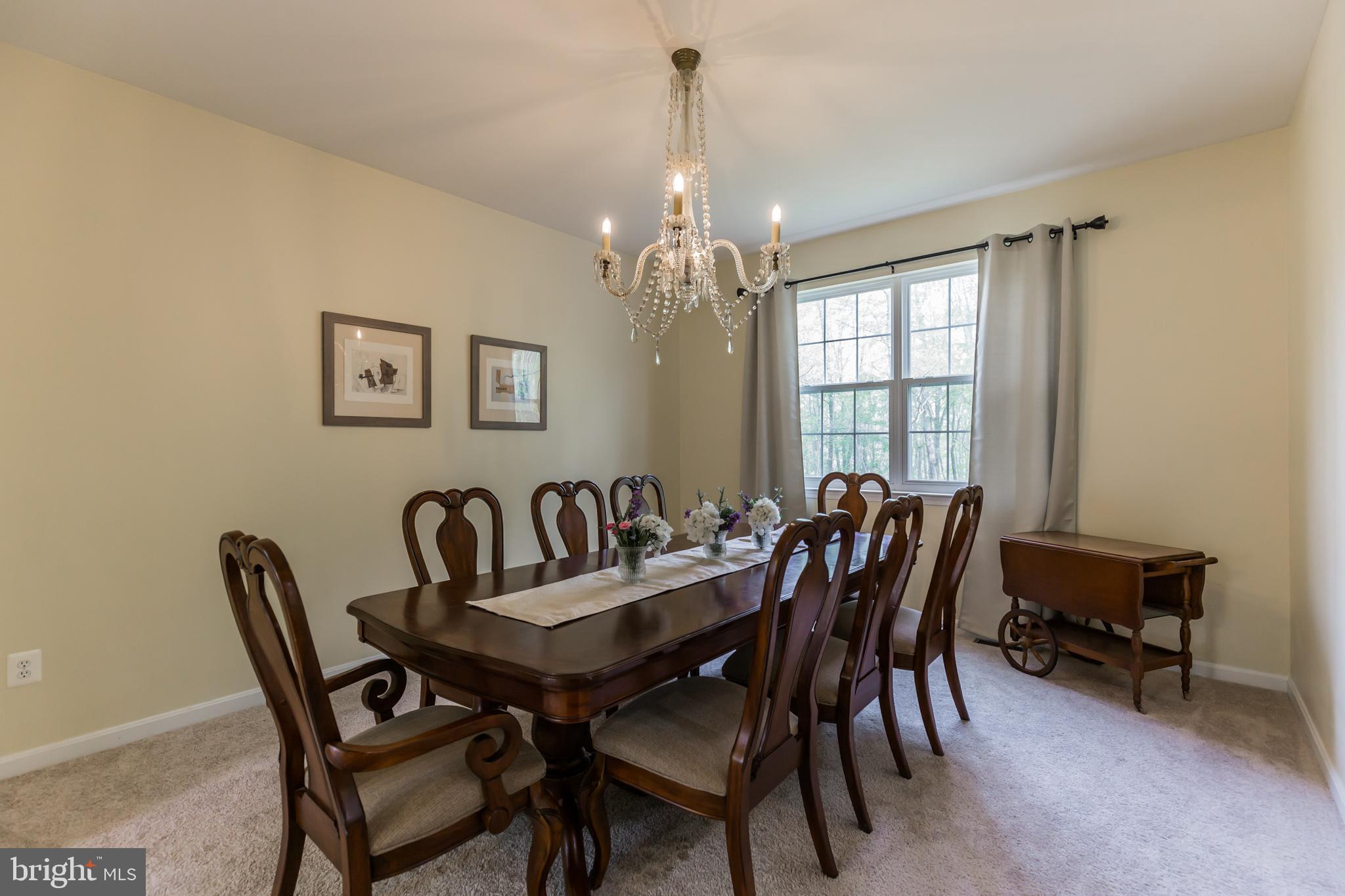 3195 Hickory Ridge Road Dunkirk, MD 20754 - Photo 12 of 41 a view of a dining room with furniture and window