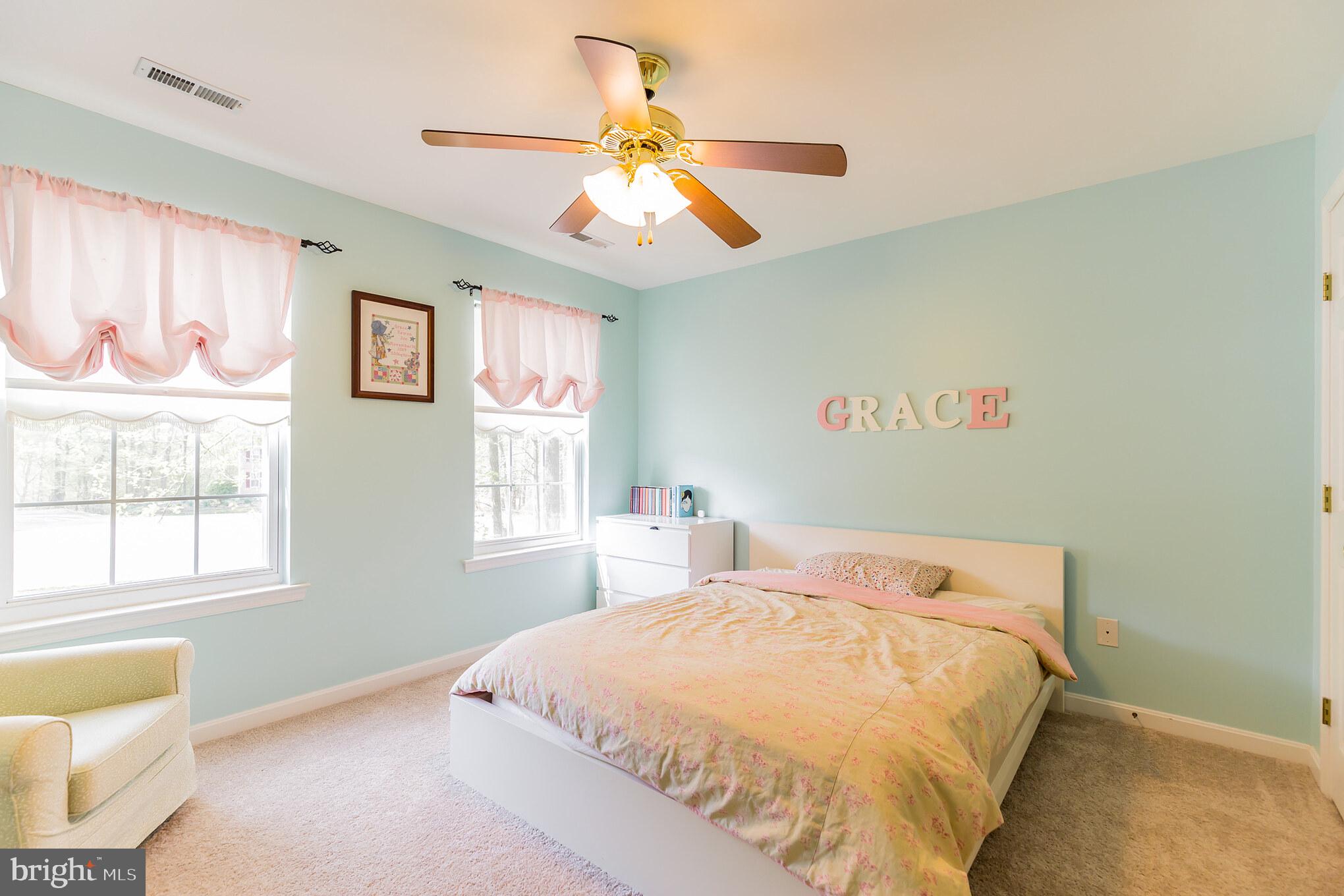 3195 Hickory Ridge Road Dunkirk, MD 20754 - Photo 18 of 41 a bedroom with a bed and a window
