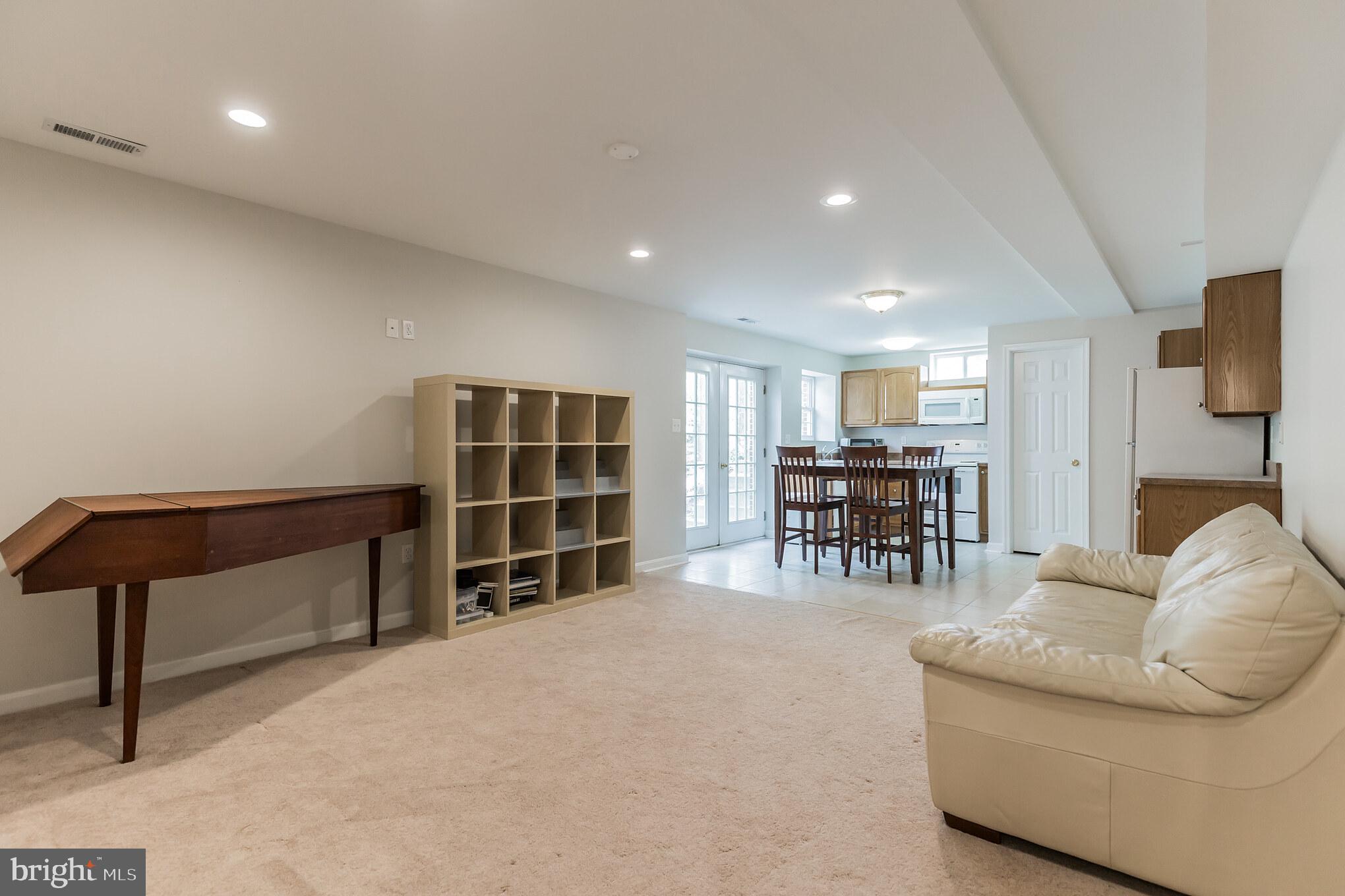 3195 Hickory Ridge Road Dunkirk, MD 20754 - Photo 27 of 41 a living room with furniture and a chair