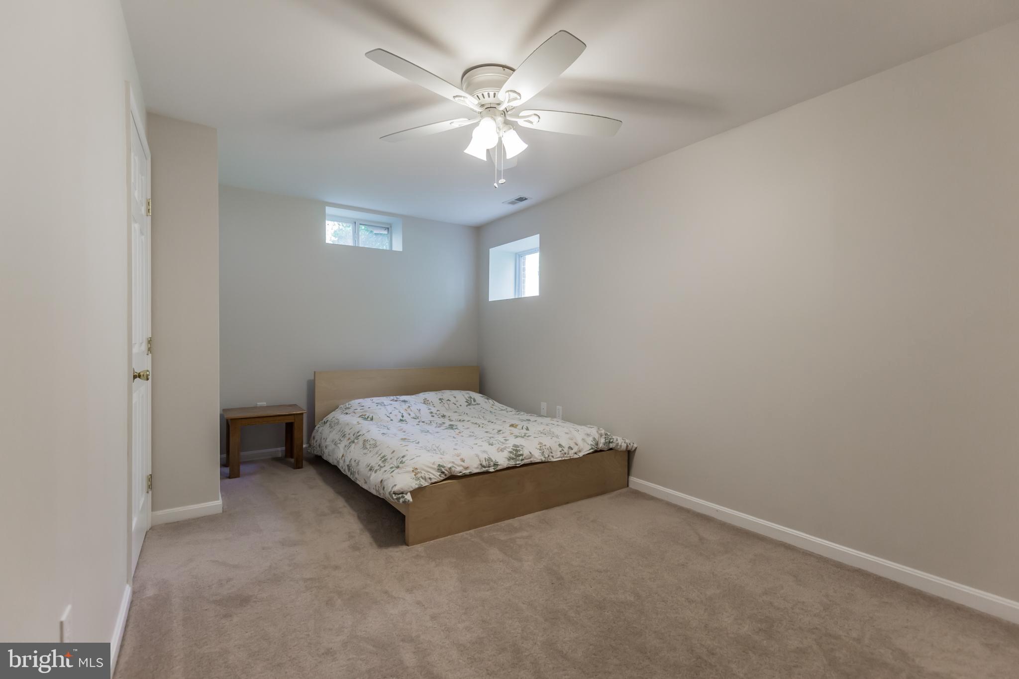 3195 Hickory Ridge Road Dunkirk, MD 20754 - Photo 29 of 41 a bedroom with a bed and a ceiling fan