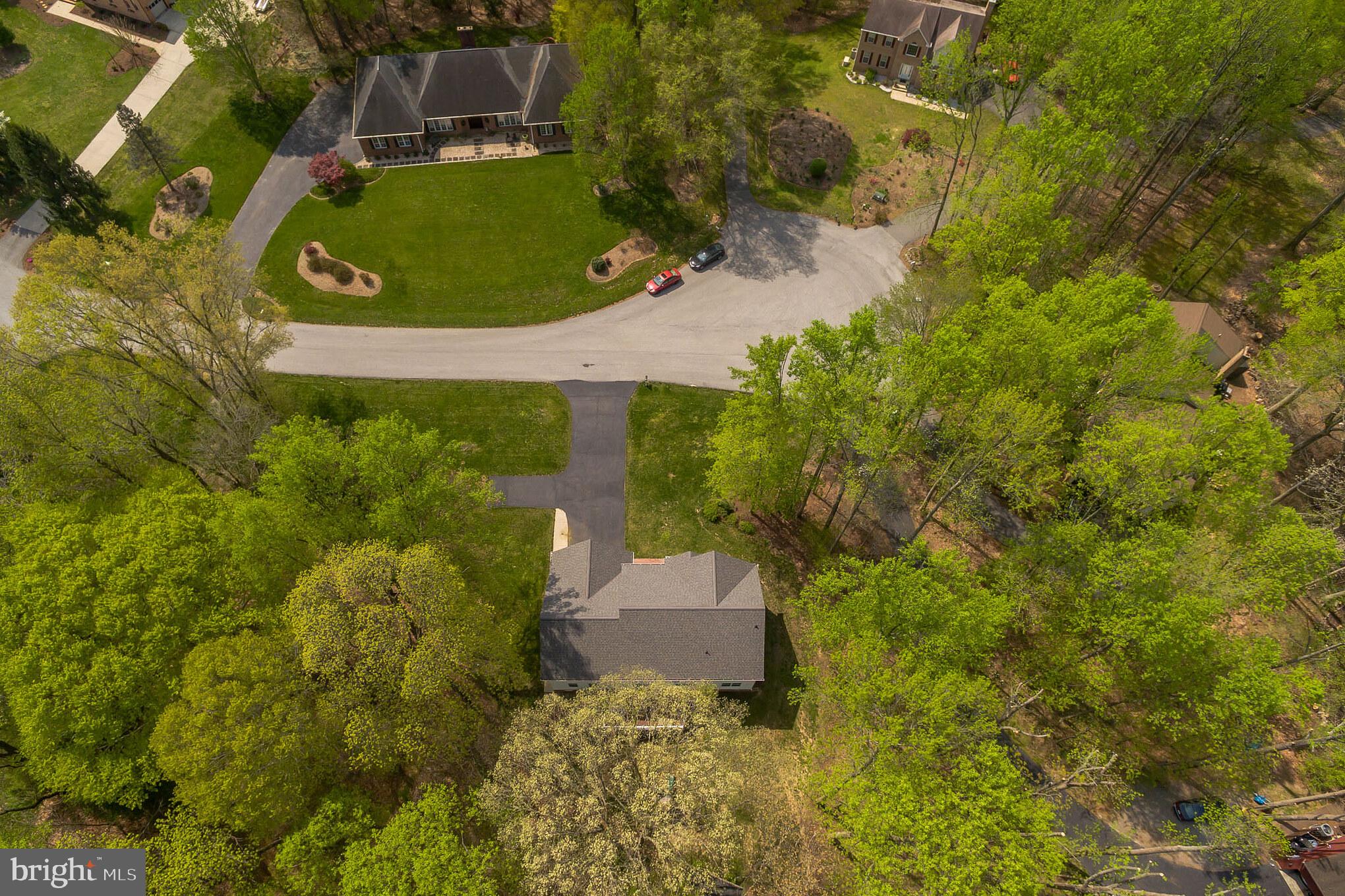 3195 Hickory Ridge Road Dunkirk, MD 20754 - Photo 35 of 41 an aerial view of a house with a yard and trees all around