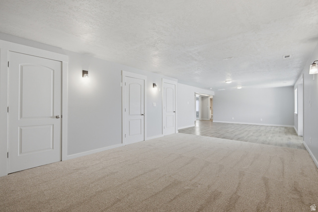 1252 Skyline Road Saratoga Springs, UT 84045 - Photo 35 of 51 Spacious room featuring neutral carpeting and light gray walls