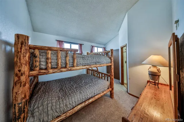 a bed room with furniture and a window