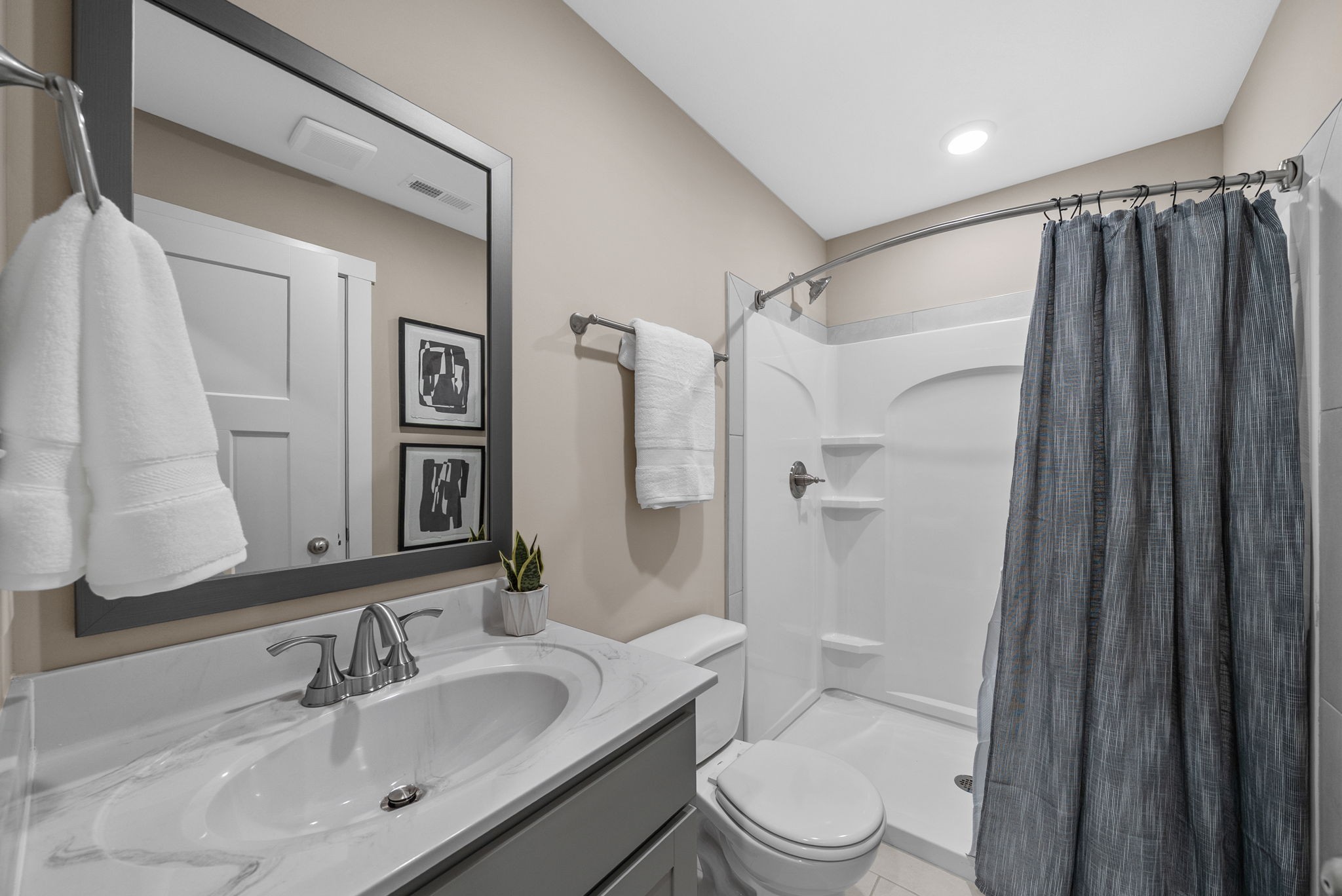 225 Primrose Way Oak Grove, KY 42262 - Photo 16 of 20 a bathroom with a sink a toilet and shower