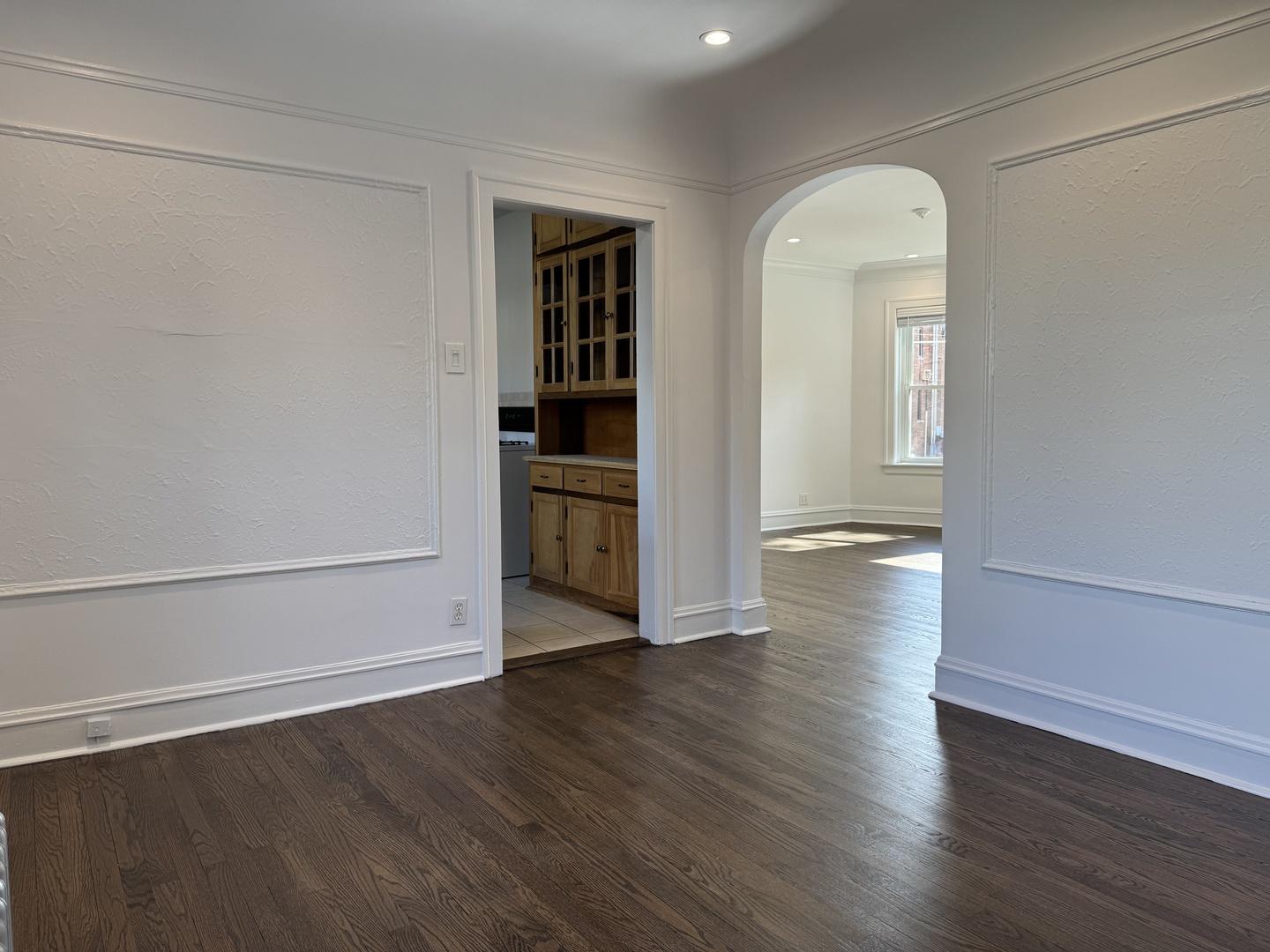 2524 West Ardmore Avenue, Unit 1 Chicago, IL 60659 - Photo 11 of 21 an empty room with wooden floor and closet