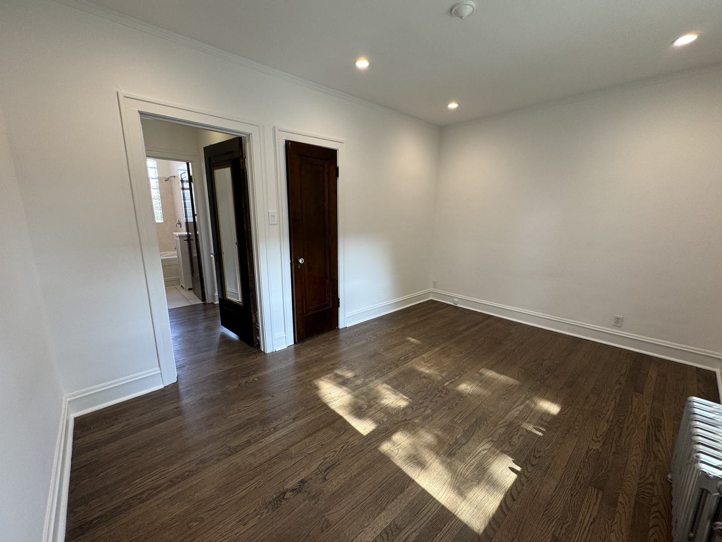 2524 West Ardmore Avenue, Unit 1 Chicago, IL 60659 - Photo 20 of 21 an empty room with wooden floor and closet
