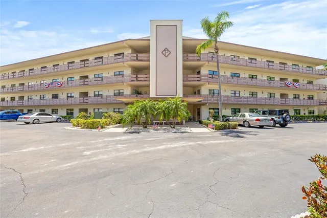 a view of a park with large trees