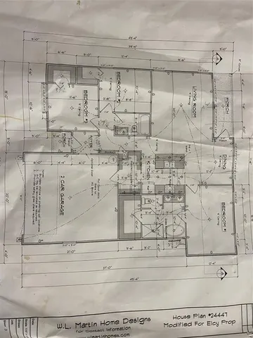 a white bath tub sitting in a bathroom