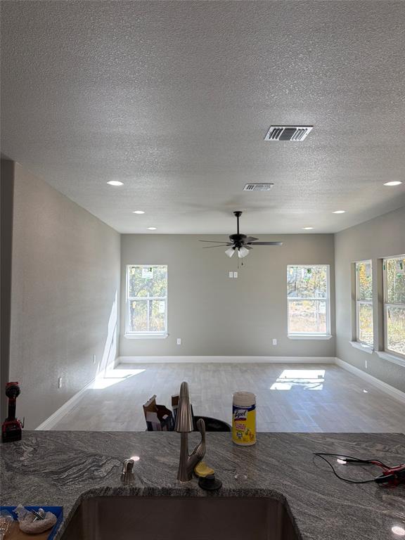 411 Hamilton Road Mineral Wells, TX 76067 - Photo 12 of 12 a kitchen with counter top space and appliances