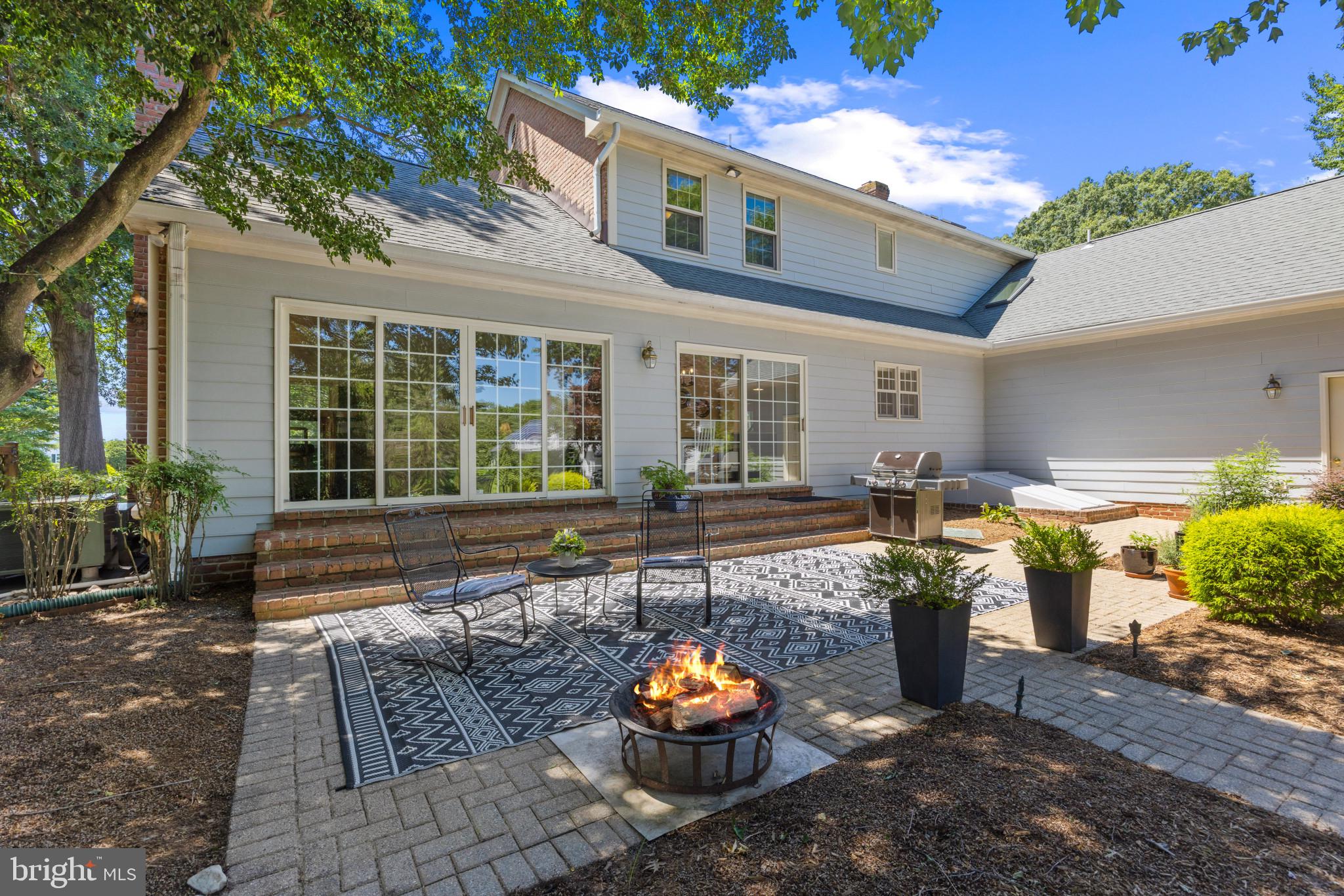 3403 Hidden River View Road Annapolis, MD 21403 - Photo 32 of 50 a front view of a house with outdoor seating