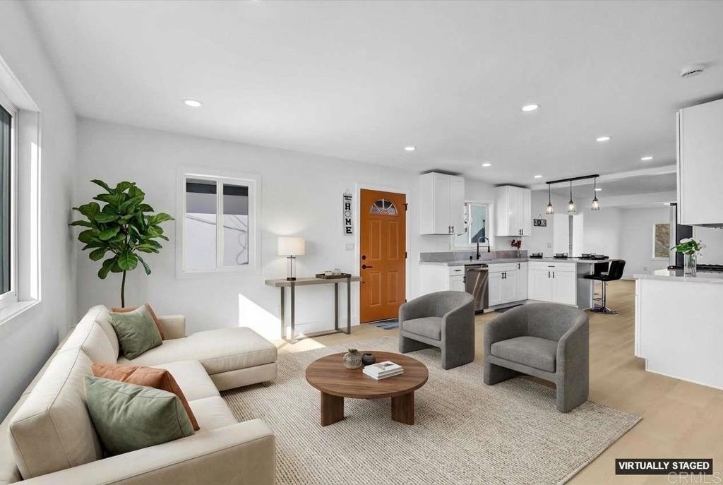 323 South 65th Street Encanto, CA 92114 - Photo 19 of 44 a living room with furniture and a view of kitchen