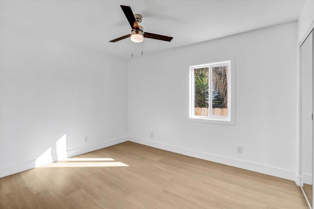 323 South 65th Street Encanto, CA 92114 - Photo 29 of 44 an empty room with a window