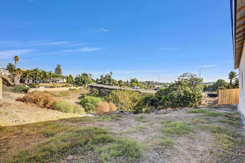 323 South 65th Street Encanto, CA 92114 - Photo 42 of 44 a view of a yard with an trees