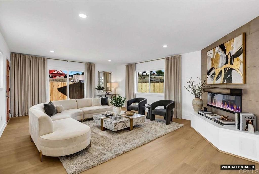 323 South 65th Street Encanto, CA 92114 - Photo 9 of 44 a living room with furniture and a flat screen tv