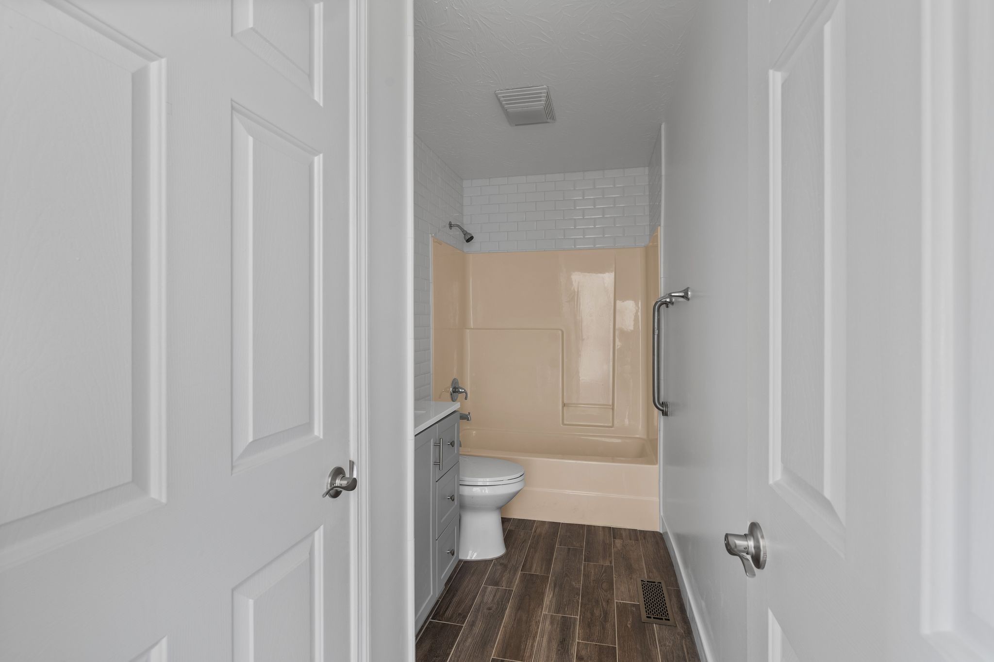 104 East Merchant Street Mount Pleasant, TN 38474 - Photo 12 of 30 a bathroom view of a toilet and a shower