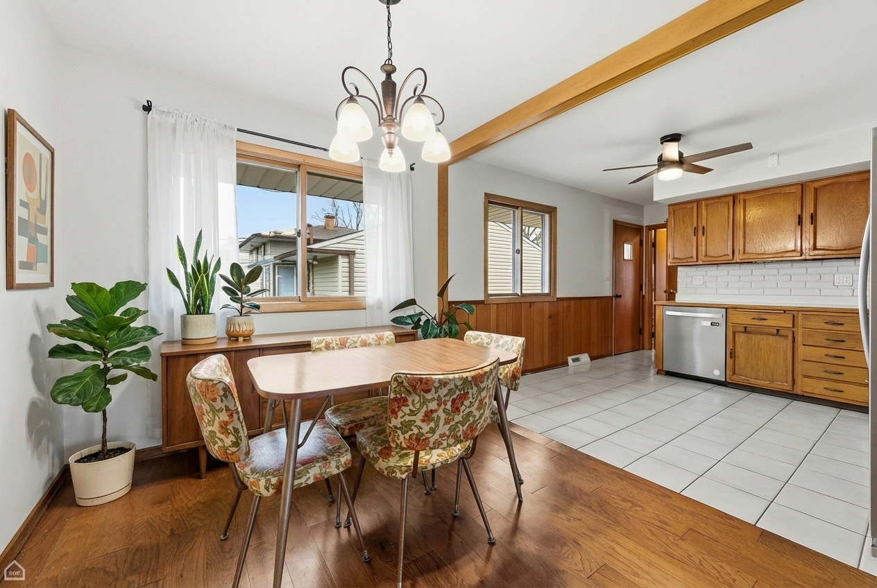 110 Westmere Road Des Plaines, IL 60016 - Photo 3 of 15 a view of a dining room with furniture window and wooden floor