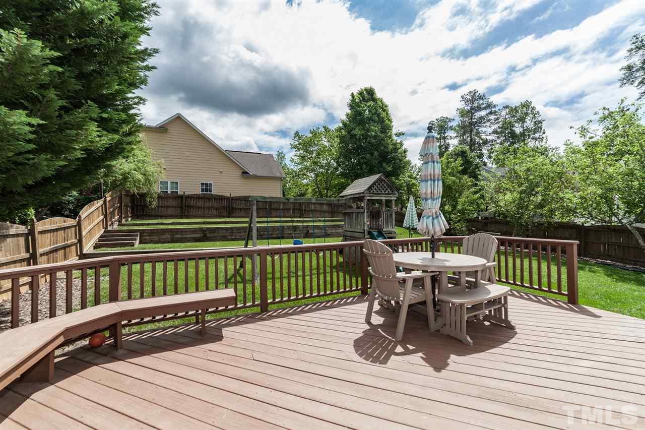 9300 Shallcross Way Raleigh, NC 27617 - Photo 24 of 25 a view of a deck with furniture