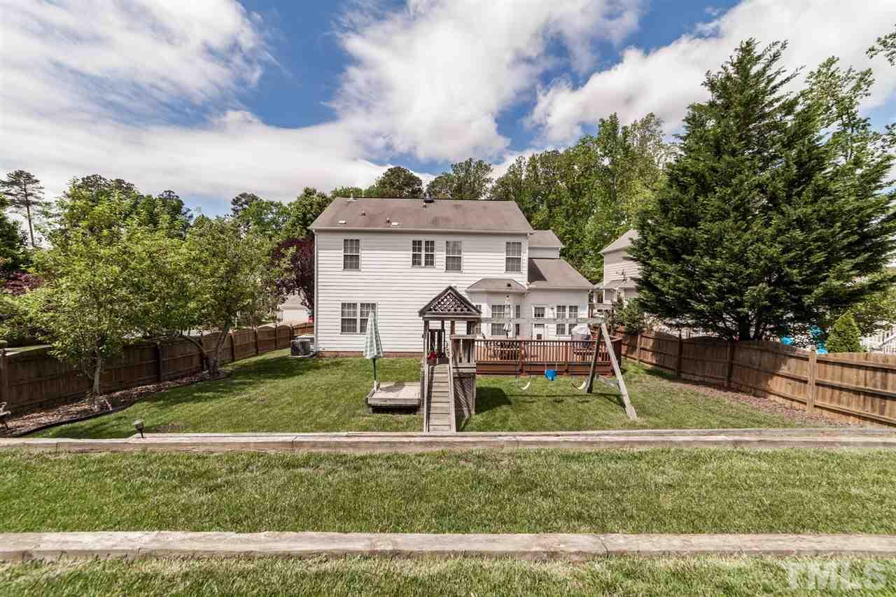9300 Shallcross Way Raleigh, NC 27617 - Photo 25 of 25 a view of a house with a yard