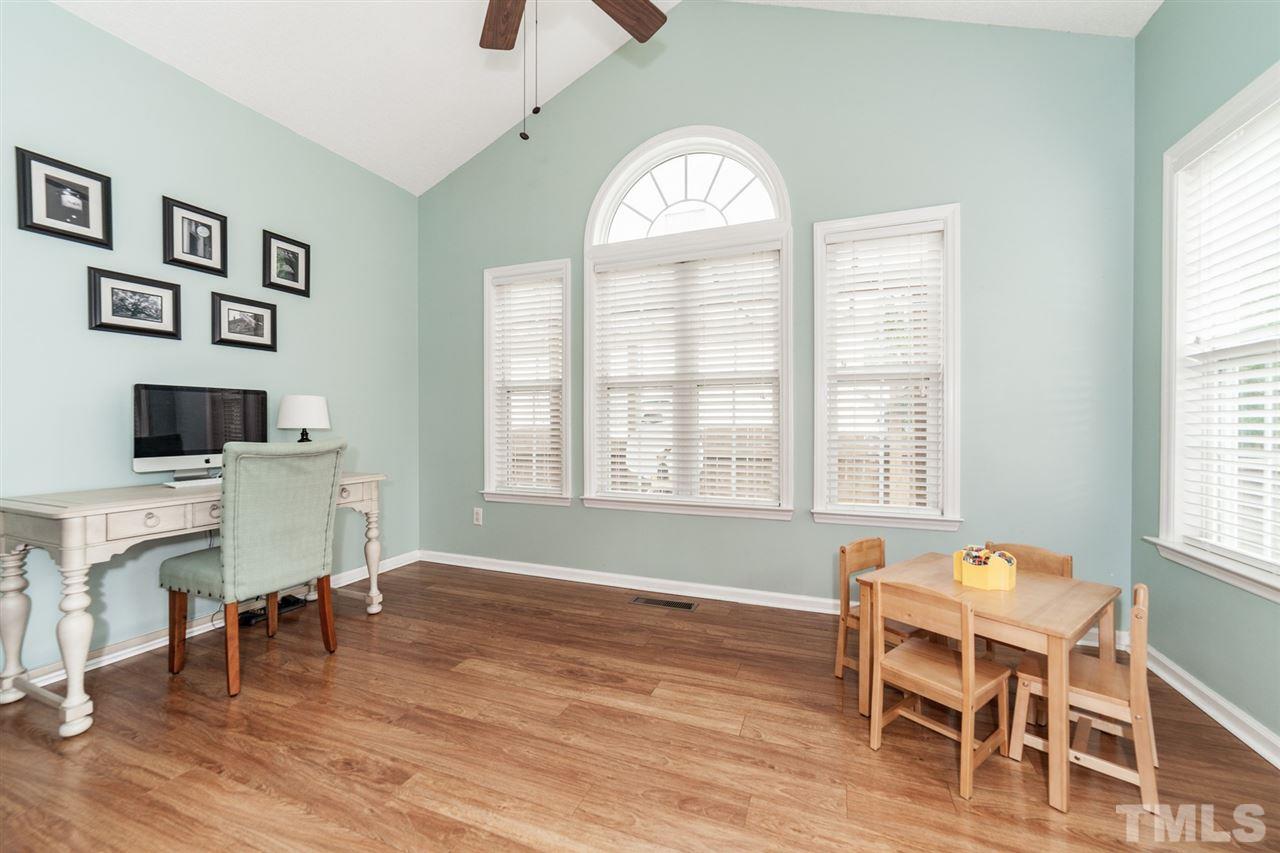 9300 Shallcross Way Raleigh, NC 27617 - Photo 10 of 25 a view of a livingroom with furniture and a window