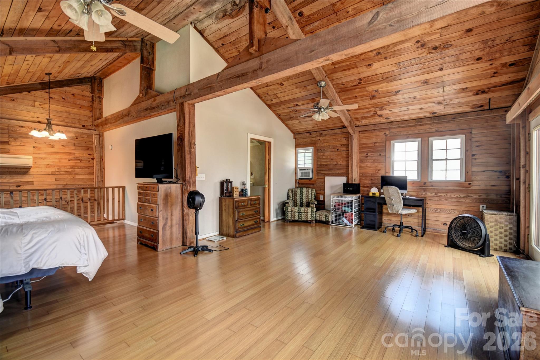 85 Homish Garden Waynesville, NC 28785 - Photo 17 of 32 a view of a livingroom with furniture and a flat screen tv