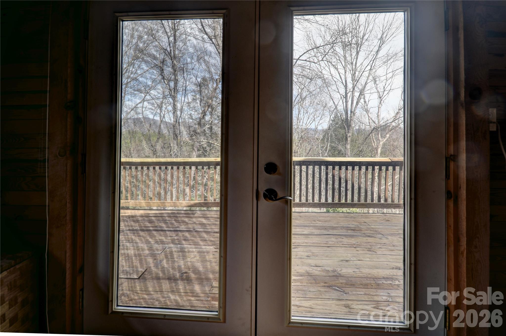 85 Homish Garden Waynesville, NC 28785 - Photo 19 of 32 a view of a wooden door with outside view
