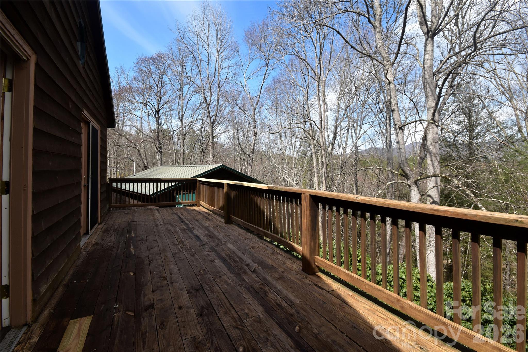 85 Homish Garden Waynesville, NC 28785 - Photo 20 of 32 a view of balcony with wooden floor and fence