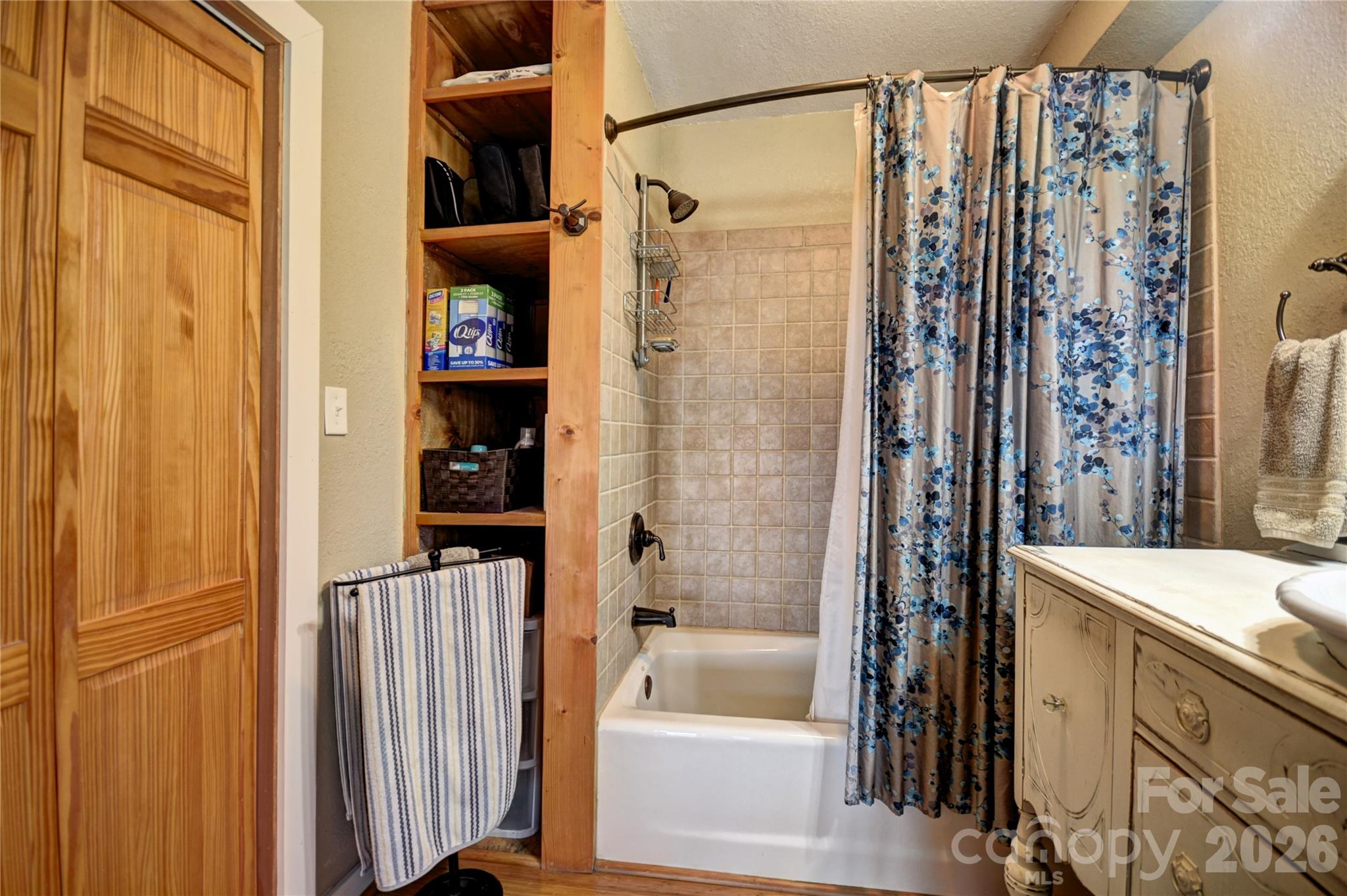 85 Homish Garden Waynesville, NC 28785 - Photo 24 of 32 a bathroom with a bathtub and a shower