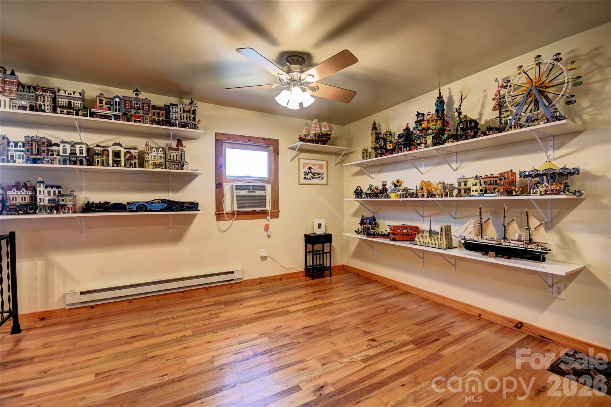 85 Homish Garden Waynesville, NC 28785 - Photo 29 of 32 a room with lot of cabinet and a wooden floor