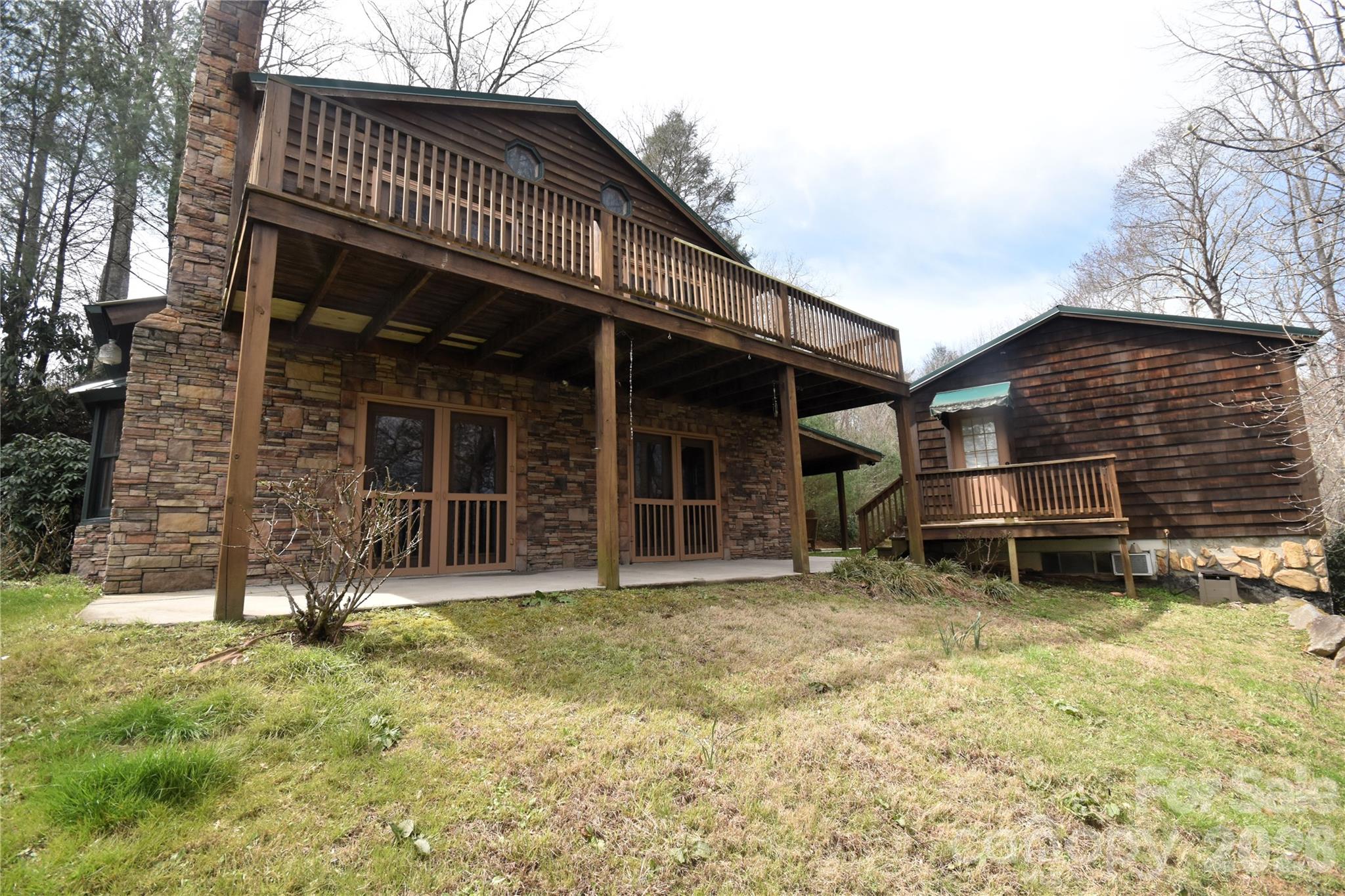 85 Homish Garden Waynesville, NC 28785 - Photo 4 of 32 a backyard of a house with barbeque oven